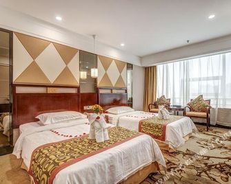 The Grand Tower International Hotel - ז'ינאן - חדר שינה