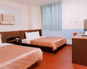 Blue Ocean Hotel - Kaohsiung - Slaapkamer