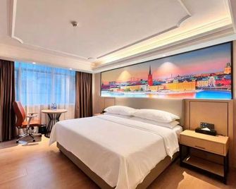 Vienna International Hotel (Shenzhen Yantian Port Hong'anwei Metro Station Branch) - Shenzhen - Bedroom