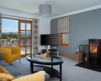 Snowmass Lodge - hot tub in Aviemore - Aviemore - Huiskamer