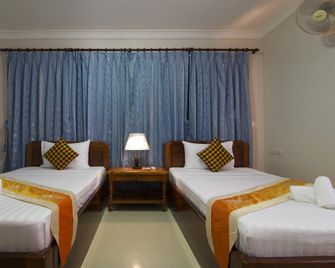 Panda Angkor Inn - Siem Reap - Bedroom