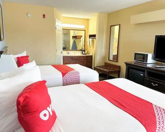 Bonita Lakes Inn by Capital O Meridian I20 - מרידיאן - חדר שינה