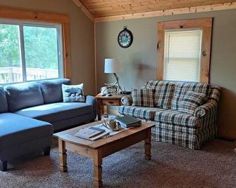 Cabin nestled in the woods for a quiet relaxing getaway with large outdoor deck! - Marshall - Living room