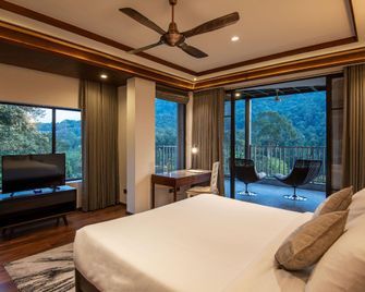 Niraamaya Retreats Samroha, Athirappilly - Vettilappara - Спальня