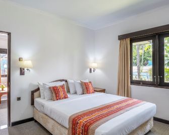 Jimbarwana Hotel - Negara - Habitación