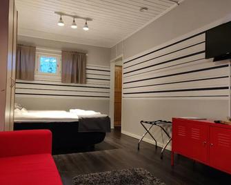 Kuerkievari Kuerhotel - Akaslompolo - Спальня