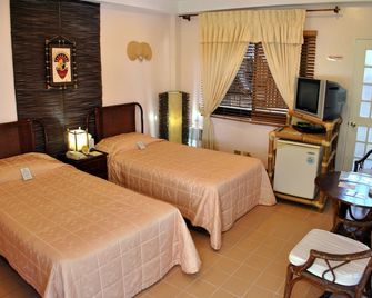 Surfside Boracay Resort - בורקאי - חדר שינה