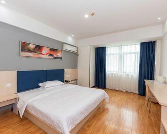 7Days Inn Wuhan Shengguandu Haining Leather City - Wuhan - Habitación