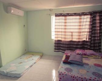 Holidayhome 45A Taman Desa Pangkor - Pangkor - Κρεβατοκάμαρα