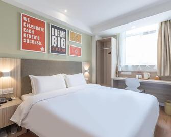 Hanting Hotel Qingdao Taidong Pedestrian Street - تشينغداو - غرفة نوم