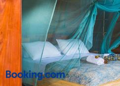 Tevana House Reef - Bira - Bedroom
