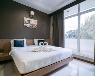 Jintana Resort - בורי רם - חדר שינה