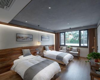 Jiuhuashan yisutingMinsu Inn - Chizhou - Спальня