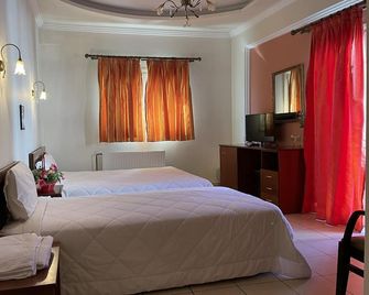 Melastron - Larissa - Habitación