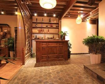 Village Green Inn - Lijiang - Recepción