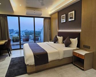 Hotel Skyro Inn - Gandhinagar - Ložnice