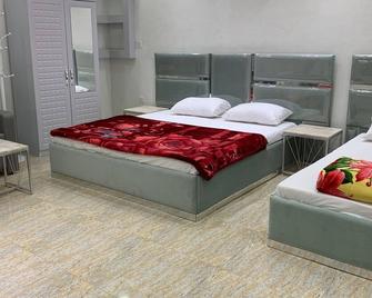 Super OYO 150 Reef Al Khaleej Resort - Muşayna‘ah - Bedroom