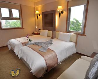 Tian Long Hotel - Jiaoxi Township - Bedroom