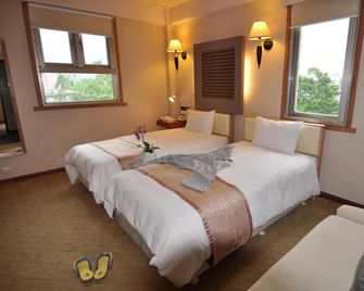 Tian Long Hotel - Jiaoxi Township - Bedroom