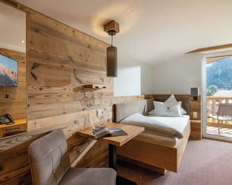 Alpenhof Hotel Garni Suprême - Zell am Ziller - Bedroom