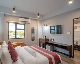 Kekehyu Business Hotel - Valencia City - Bedroom