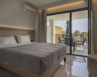 Caretta Paradise Resort & Waterpark - Tragaki - Ložnice