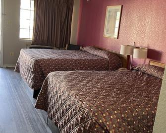 Country Inn Motel - San Antonio - Bedroom