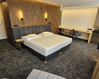 هارموني كلوب هوتل أوسترافا - اوسترافا - غرفة نوم
