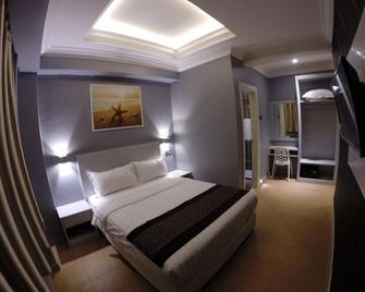 Ocean Inn - Semporna - Bedroom