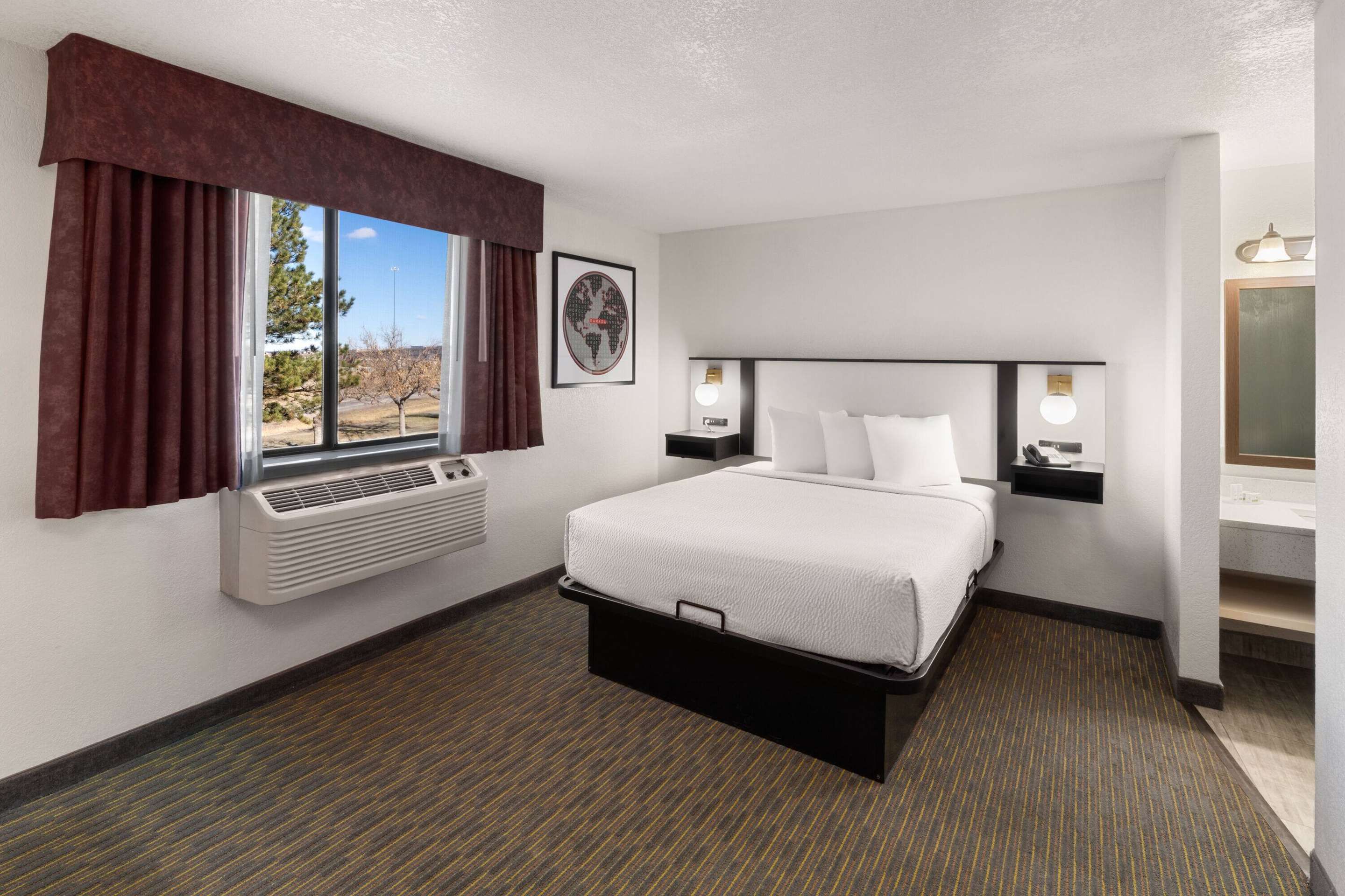 Sylo Hotel Denver Airport, A Ramada By Wyndham - אורורה - חדר שינה
