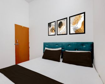 Spot On Vs Grand - Sītāpur - Bedroom