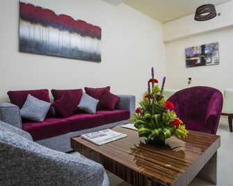 The View Al Barsha Hotel Apartments - Dubai - Living room