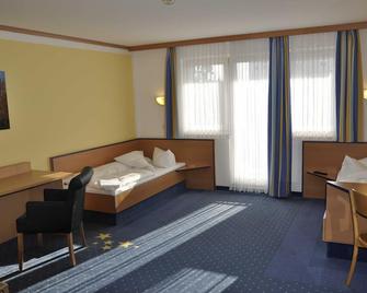 Double Room Twin (3) - Sleep & Go Hotel Magdeburg Gmbh - Магдебург - Спальня