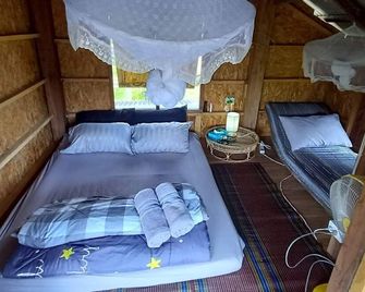 Chinopuu Hut Homestay - Chiang Dao - Schlafzimmer