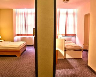 Hotel am Schottenpoint - וינה - חדר שינה