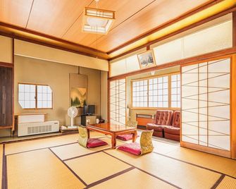 Kaneki Hotel - Yamanouchi - Schlafzimmer