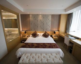 Suzhou Sun Plaza Hotel - Suzhou - Schlafzimmer