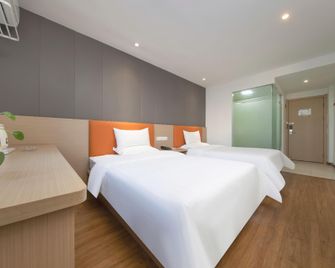 7Days Inn Zhenjiang Dashikou - Zhenjiang - Ložnice