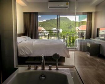 Eurotel Hotel - קאנצ'אנאבורי - חדר שינה