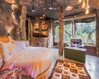 Parakkat Nature Resort - Munnar - Yatak Odası