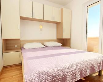 Two bedroom apartment with terrace Novalja, Pag (A-9403-b) - Novalja - Schlafzimmer