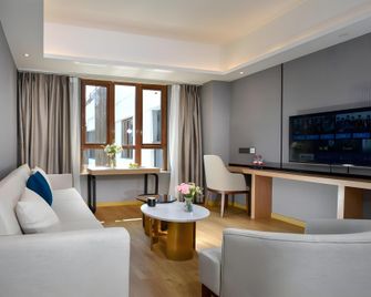 Zhongxin Yuedong Hotel - Liangshan - Schlafzimmer