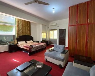 Lal Lodges Suite Apartment - Islamabad - Bedroom