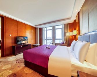 New Zijin Hotel - Huzhou - Schlafzimmer