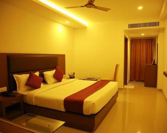 Hotel Malika Residency - Ettumanoor - Bedroom