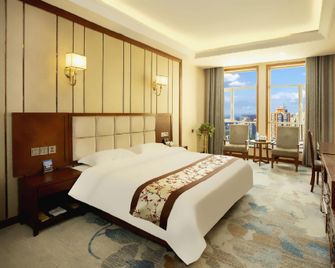 Tian Run Jin Zuo Hotel - Zhangye - Schlafzimmer