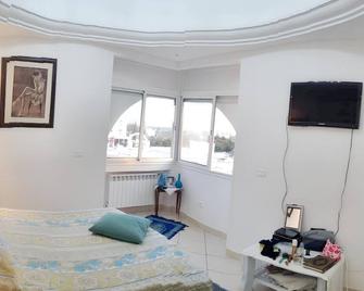 Sea View Apartment in Hammamet with Shared Pool - Hammamet - Yatak Odası