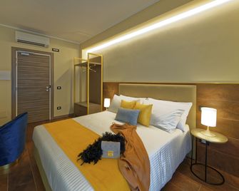 Red Ribbon - מילאנו - חדר שינה