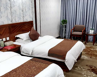 Zhongtian Hotel - Aksu - Habitación