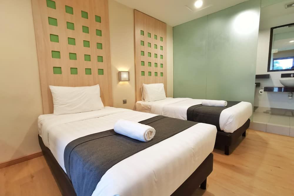 Hotel 98 - קוצ'ינג - חדר שינה